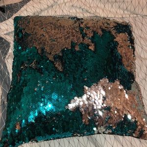 Sparkly pillow different color by touch